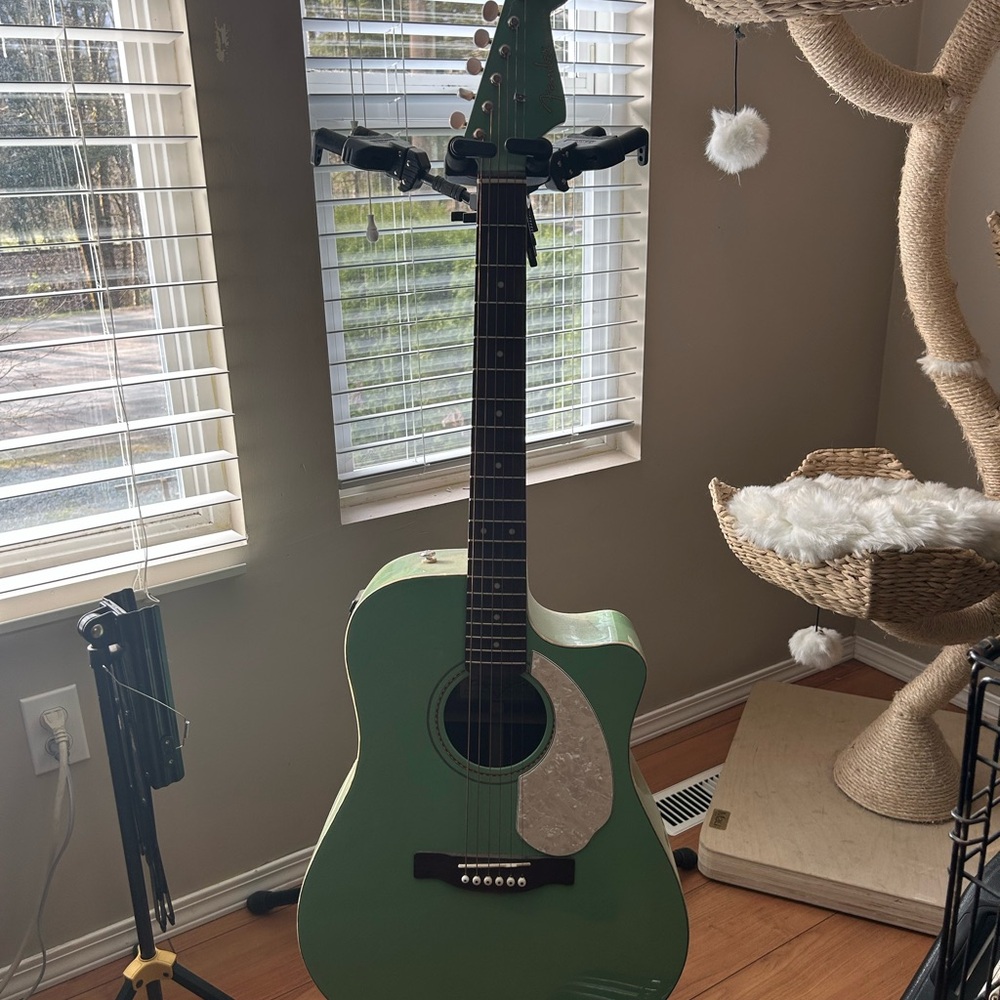 Green Acoustic Guitar with Silver Pickguard